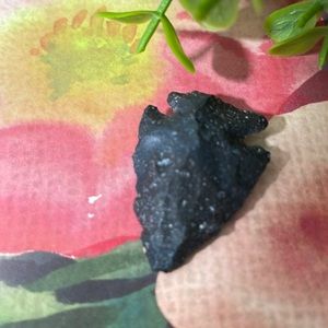 Black hand cut arrowhead spear head